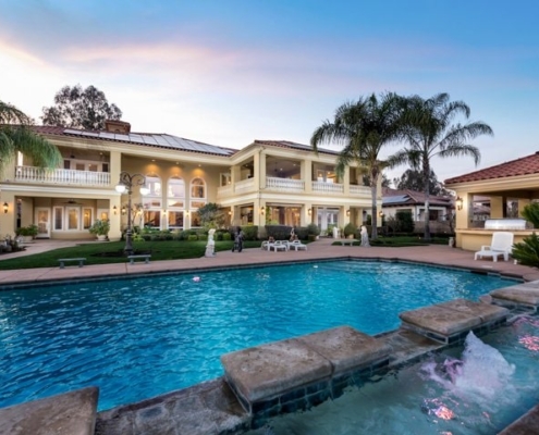 Photo of Spacious home with pool and patio. Luxurious size home