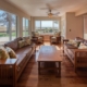 Photo of interior view on living room with all wood furniture on wooden floors